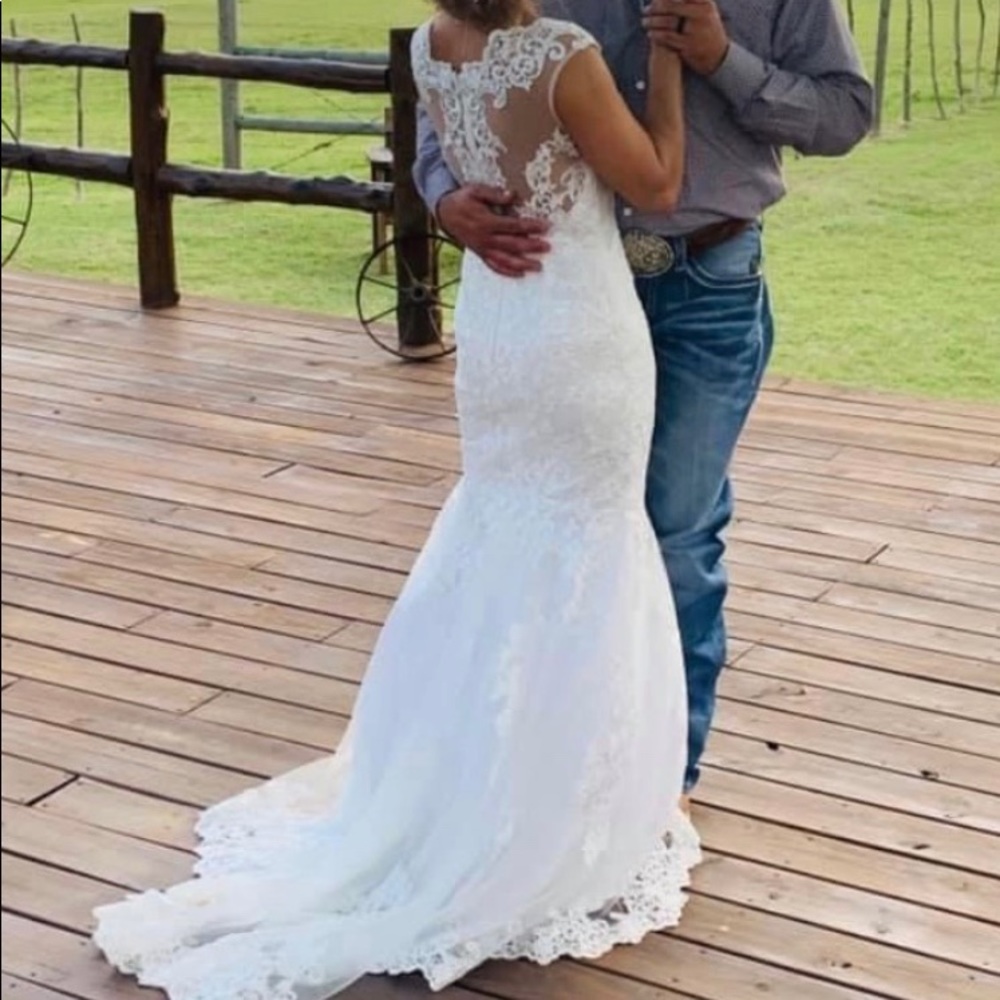 Wedding dress bought new  in April 2021 has been cleaned and stored in a bag
